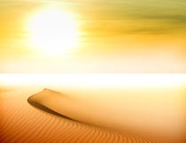 阳光笼罩下美丽的沙漠风光摄影图片
